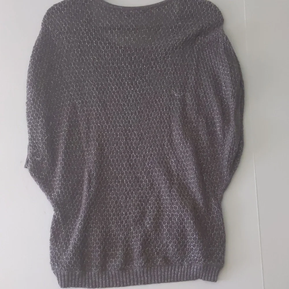 Gray and cream batwing type/ sleeveless crochet sweater. Women's size large